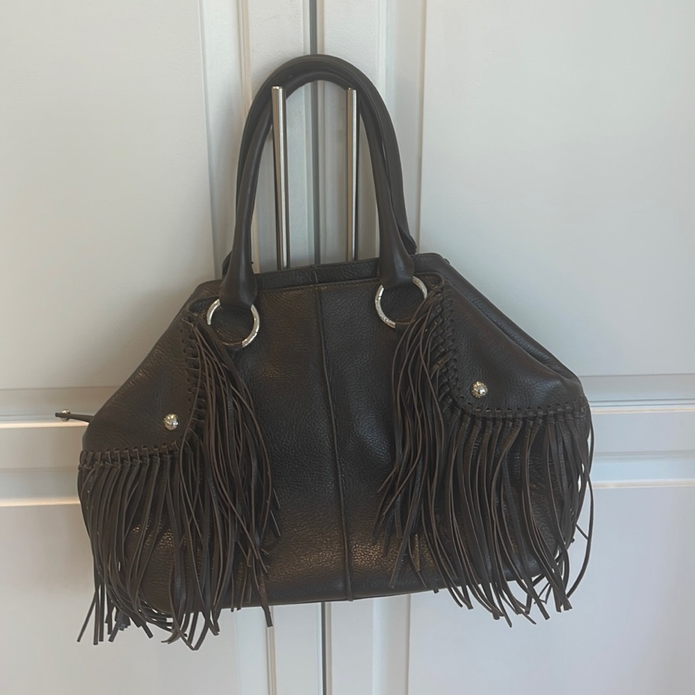 Authentic Tod’s brown leather purse with leather fringe.